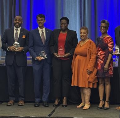 NAMC presenting Council President and others with an award